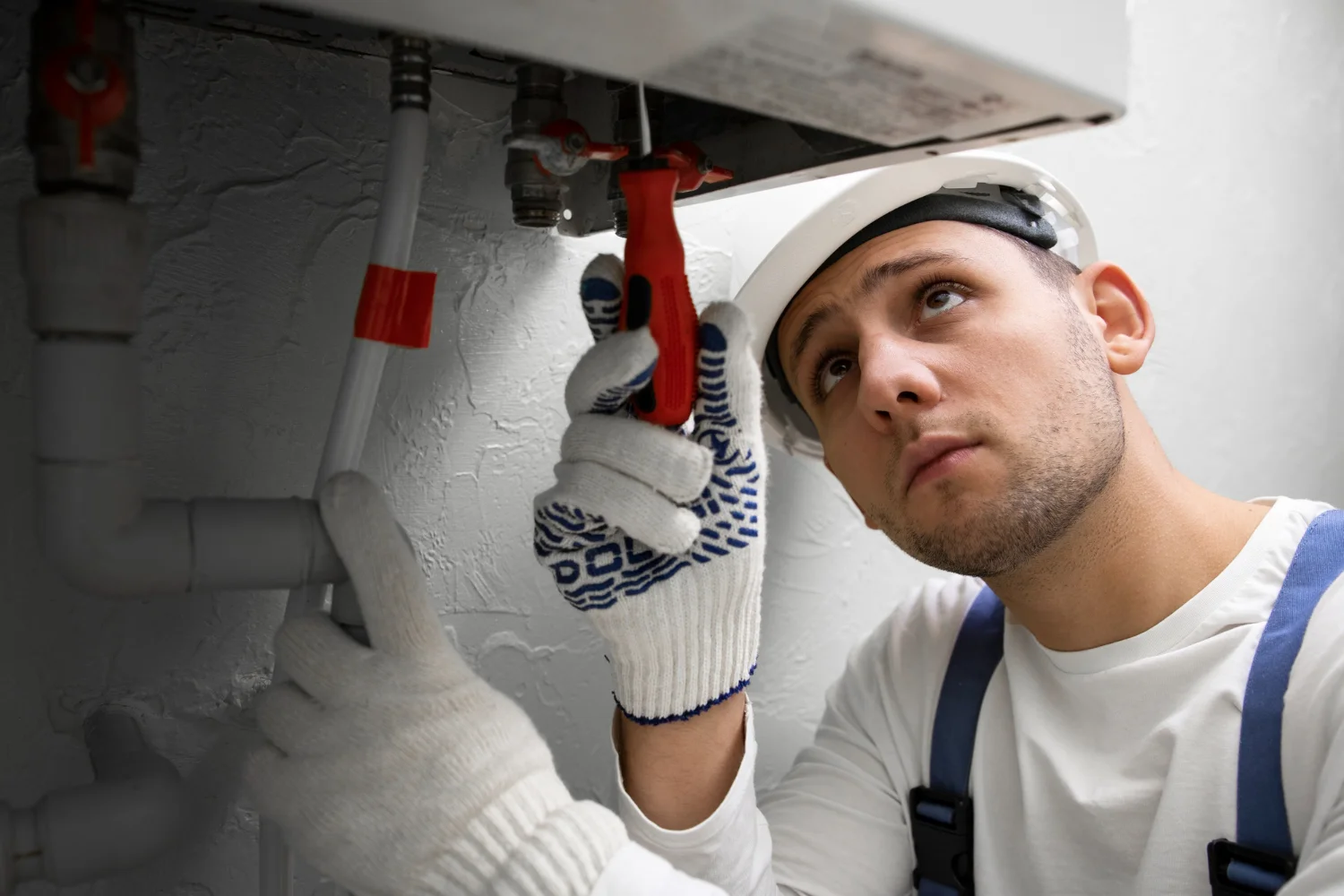 hot water system repair vs replace